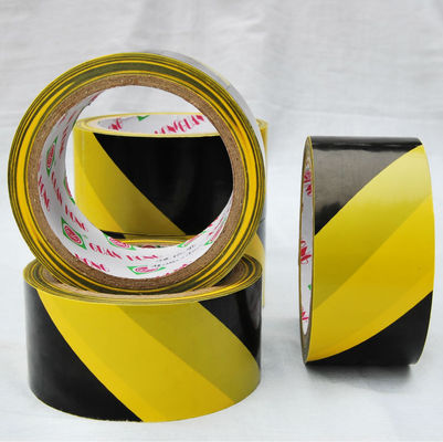 中国 12mm/24mm の冷たい/高圧抵抗の黒くおよび黄色の警告テープ サプライヤー